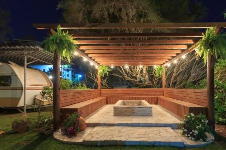 Cozy outdoor area in South Pasadena featuring gazebo with fire pit and seating
